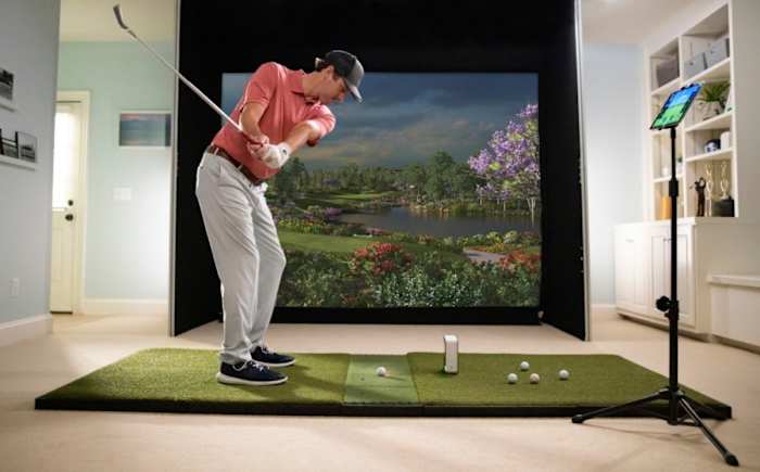 SkyTrak's simulation feature allows golfers to play any of a dozen courses, including Pebble Beach, St. Andrews, Erin Hills, Chambers Bay and Bethpage Black.